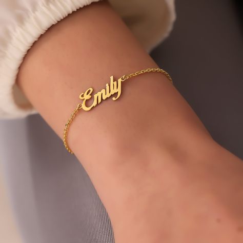 "The Elegant Name Bracelet and Family Birthstone Bracelet, which we offer in 925 Carat Silver or 14 Carat Gold, is the best gift for the mother. The 14K solid version of the birthstone bracelets also comes with a 14K solid gold chain. There is a perfect harmony of silver or gold. Quality in this handmade gold and silver birthstone bracelet.  PRODUCT HIGHLIGHTS  Custom Bracelet For Women Made of High Quality 925 Sterling Silver or 14K Solid Gold You can personalized this silver bracelet with your Silver Name Bracelet, Handmade Gold Necklace, Nameplate Bracelet, Name Bracelets, Bracelet Initial, Gift For Mothers Day, Custom Bracelet, Birthstone Bracelet, Solid Gold Chains