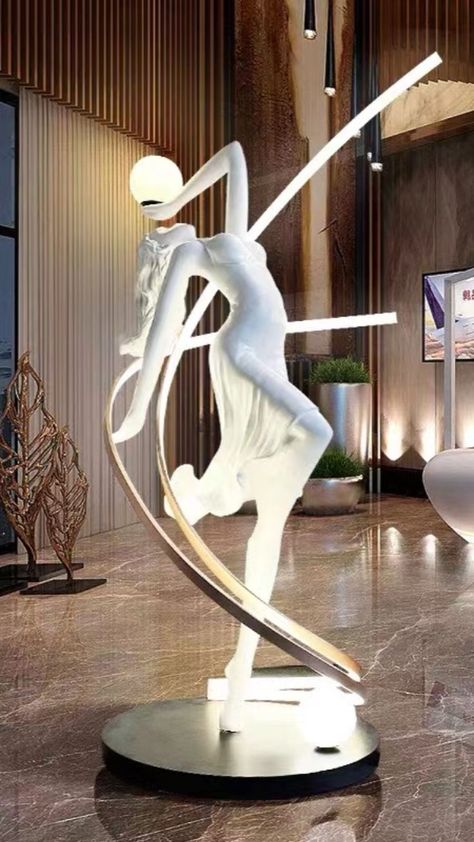 A dancing women sculpture is holding lamps in her hands. Sculpture Lighting, Tall Sculpture, Art Statues, Weird Furniture, Spa Interior Design, Sculpture Decor, Sculpture Stand, Interior Design Sketches, House Design Pictures