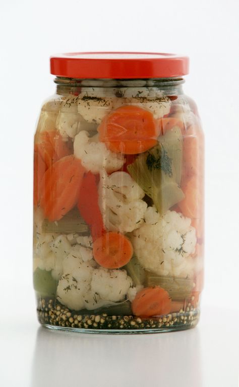 This recipe for Italian giardiniera is a condiment made with mixed vegetables like cauliflower, onion, and carrots that are pickled with spices. Giardiniera Recipe, Pickled Vegetables Recipe, Pickled Cauliflower, Canning Pickles, Coconut Dessert, Breakfast And Brunch, Oktoberfest Party, Brownie Desserts, Homemade Pickles