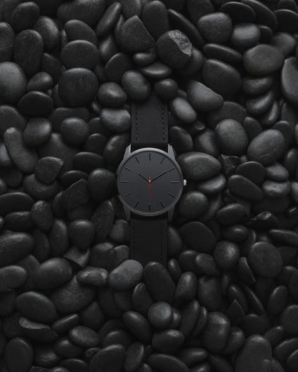 "Black on black" by Ewan Paton #fstoppers #Product #pebbles #Stones #watch #black #blackwatch #surface #detail #birdseyeview Photography Ideas Product, Black On Black Photoshoot, Black Product Photography Ideas, Black On Black Photography, Product Photography Black Background, Masculine Product Photography, Dark Product Photography Ideas, Black On Black Photography Product, Black Product Photography