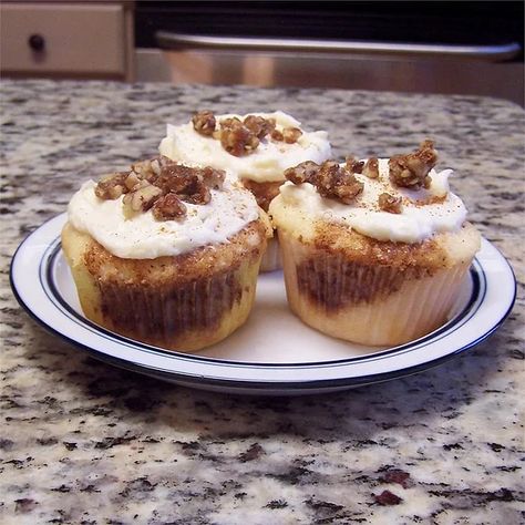 Cinnabon® Cupcakes Recipe | Allrecipes Flavored Cupcakes, Fluffy Frosting, Cinnamon Syrup, Cinnamon Cake, Warm Cake, Cupcake In A Cup, Cupcake Flavors, Coffee Cakes, Cupcakes Recipe