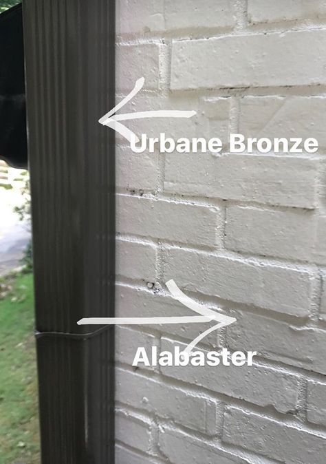 Urbane bronze and alabaster paint colors Painted Brick House Exterior Alabaster, Alabaster And Urbane Bronze Exterior, Colors That Go With Urbane Bronze Exterior, Alabaster Painted Brick Exterior, Best Exterior Stucco Paint Colors, Urbane Bronze And Alabaster, Alabaster Brick Exterior, Urbane Bronze Exterior Trim, Alabaster House Exterior