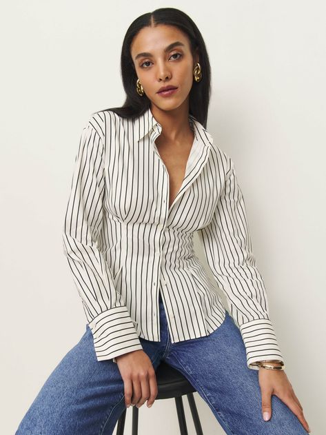 Buttoned up. Shop the Becker Shirt from Reformation, a long-sleeve top with a collared neckline, button front, and tailored waist.