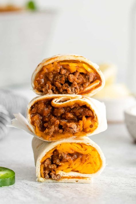 This Taco Bell Chili Cheese Burrito dupe recipe tastes exactly like the real deal. You only need 6 ingredients and 25 minutes! Chili Cheese Burrito Taco Bell, Cheese Burrito Recipe, Chili Cheese Burrito, Cheese Burrito, Copycat Taco Bell, Cheddar Cheese Recipes, Chili Pasta, Ground Turkey Tacos, Burrito Recipe