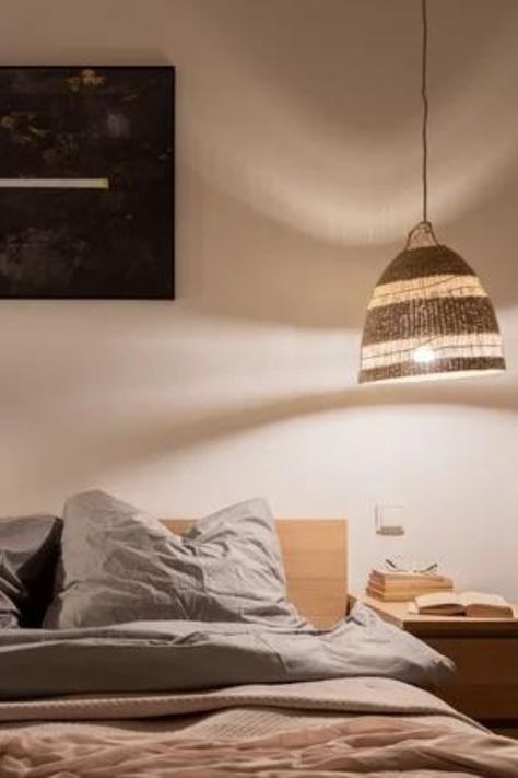 For a soft and diffused kind of light that's perfect for bringing about bedtime bliss, suspend rattan pendant lampshades from the ceiling on either side of the bed. Read More: https://www.housedigest.com/1020233/20-unique-bedside-lighting-ideas-to-brighten-up-your-space/ Bedside Pendant Lights, Rattan Ceiling, Guest Room Design, Hanging Bed, Rattan Pendant, Rattan Pendant Light, Pendant Lamp Shade, Bedside Lighting, The Ceiling