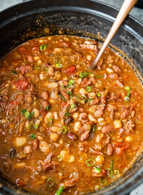 Easy 15 Bean Soup recipe for the perfect cozy pot of soup in the winter! Made with dry bean mix, tomatoes, warm spices and a meaty ham bone. Mixed Dried Beans Recipes, Southern Bean Soup, Dry Bean Soup Recipes, Dried Bean Soup Recipes, 15 Bean Soup Recipe Stove Top, 12 Bean Soup, Ground Meat Soup, Dried Bean Soup, Crockpot 15 Bean Soup