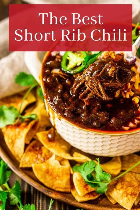 This the absolute best short rib chili you'll ever try! Made with a dried chile paste for a deeper flavor, every spoonful of this chili recipe is loaded with shredded short ribs and hearty black beans with the perfect spice kick. Everyone will devour this short rib chili! Short Ribs Chili Recipe, Short Rib Chili, Short Ribs Recipe, Chili Recipe Crockpot, Chili Recipe Easy, Short Rib, Beef Short Ribs, Party Food And Drinks, Beef Ribs