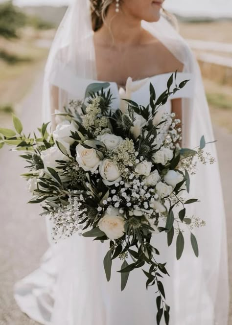 Elegant and Minimalistic: A Stunning White and Green Wedding Bouquet No Rose Wedding Bouquet, Wedding Bouquets Bride Greenery, Bride Bouquets Emerald Green, Moss Green Wedding Bouquet, Sage And White Flowers Wedding, Bride Bouquets White Elegant Cascade, Timeless Wedding Bouquet The Bride, Natural Bride Bouquet, White Flowers With Greenery Bouquet