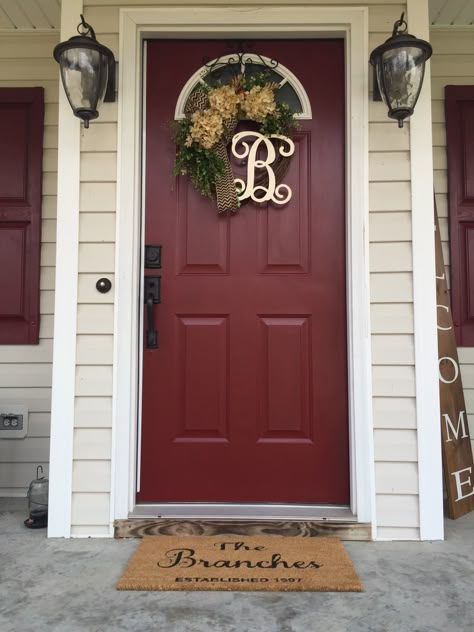 Updated my front door with Rustoleum Claret Wine. Love how it turned out. Burgundy Front Door Colors, Wine Color Front Door, Beige House Red Door, Burgundy Doors On Houses, Cranberry Front Door, Tan House Red Door, Dark Red Front Door, Maroon Front Door, Maroon Shutters Tan House