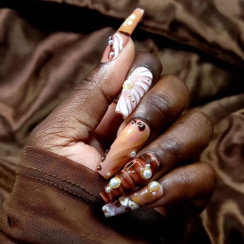 Something a lil sassy #pinterestnails #pressonnailset #pressons #nailart #covetedclaws #obsessed Brown Pearl Nails, Nude Inspo, Abstract Designs, Price Quote, Brown Shades, Gold Accents, Press On Nails, Statement Pieces, Abstract Design