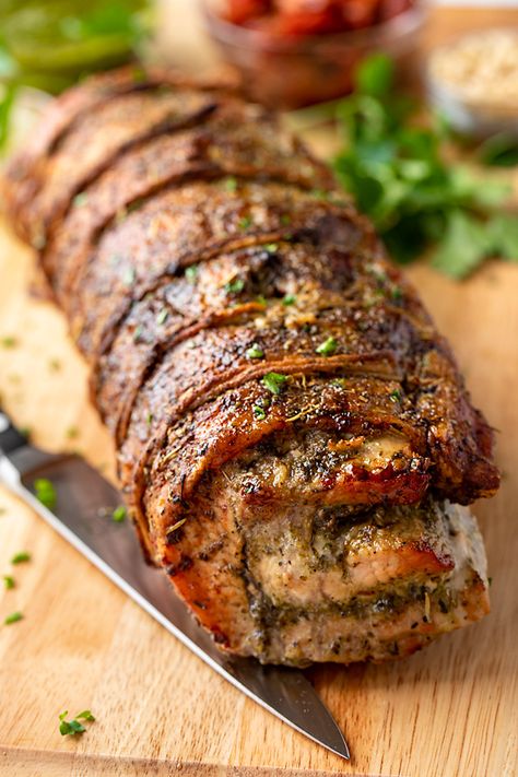 Pork Loin Stuffed With Pesto And Prosciutto, Pork Loin Recipes Italian Dressing, Pork Dinner Party Recipes, Pesto Stuffed Pork Tenderloin, Mediterranean Stuffed Pork Loin, New Year Pork Recipes, Pork Loin Stuffed With Pesto And Prosciutto Food And Wine, Pork Loin Pinwheel, Pork Loin Roast Stuffed