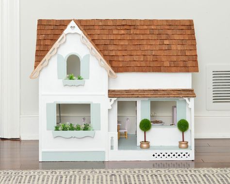 Young House Love | A Tiny House Makeover (Ok, It’s A Dollhouse) | https://www.younghouselove.com Wooden Doll House Makeover, Playroom House, Doll House Makeover, Dollhouse Furniture Plans, Dollhouse Makeover, Dollhouse Design, Haunted Dollhouse, Young House, House Makeover