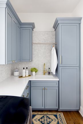 Cabinet Color is Benjamin Moore Van Courtland Blue. Stephanie Gamble Interiors Benjamin Moore Porcelain Glaze, Benjamin Moore Greenhow Blue, Bm Boothbay Gray Cabinets, Light Blue Laundry Room Cabinets, Polaris Blue Benjamin Moore, Santorini Blue Benjamin Moore, Blue Laundry Room Cabinets, Kitchen With Blue Cabinets, Blue Kitchen Island