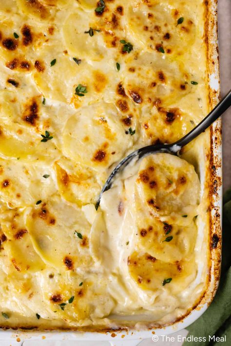 Searching for the ultimate comforting potato side dish? These scalloped potatoes are exactly what you need! This recipe is inspired by the way my mom would make scalloped potatoes, and it has graced our table at countless family gatherings. Today, I'm sharing everything you need to know to make cheesy, comforting scalloped potatoes that'll steal the show. #theendlessmeal #scallopedpotatoes #potatoes Southern Living Scalloped Potatoes, Crockpot Scalloped Potatoes Easy, Scalloped Potatoes With Cream, Scalloped Potatoes Crockpot, Homemade Scalloped Potatoes, Potato Side Dishes Easy, Best Scalloped Potatoes, Cooks Illustrated Recipes, Great Sides