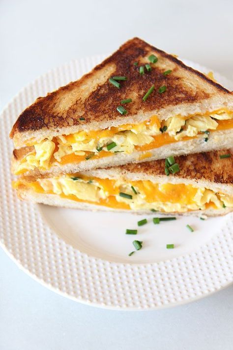 Breakfast Grilled Cheese is my crunchy, cheesy, and creamy fast dinner reward for a happy long day! This would work great as an on-the-go breakfast as well! #comfortfood #breakfastfordinner #grilledcheese Breakfast Ideas Easy Quick, Breakfast Grilled Cheese, Eggs For Dinner, Fast Dinner, Creamy Eggs, Best Grilled Cheese, Fast Dinner Recipes, Grilled Cheese Recipes, Fast Dinners