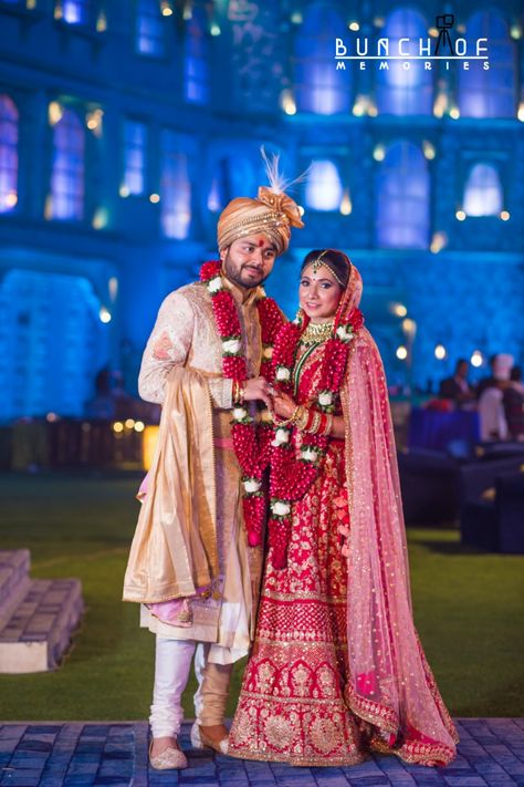 Candid Couple Shot - Bride in a Red Sequinned Lehenga and Groom in a Traditional Suit. WeddingNet #weddingnet #indianwedding #indianbride #bride #bridal #sequinned #lehenga #bridallehenga #weddinglehenga #suit #green #gold #red 
FOLLOW OUR INSTAGRAM @WEDDINGNET Dulhan Dulha Pose, Dulha Dulhan Couples Photography, Sadi Photo, Sequinned Lehenga, Couple Post, Bride Lehenga, विवाह की दुल्हन, Bride Groom Photoshoot, Dulha Dulhan