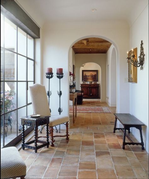 Beautiful hallway with saltillo tile and floor to ceiling window. Modern Mediterranean Homes Interior Design, Mediterranean Home Interior, Modern Mediterranean Homes, Spanish Hacienda, Saltillo Tile, Spanish Decor, Spanish Style Home, Casas Coloniales, Spanish Style Homes