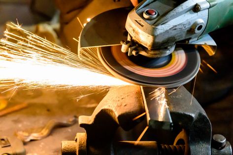 Download more Premium stock photos on Freepik Mechanic Man, Metal Grinding, Welding Process, Car Repair Service, Grinding Machine, Angle Grinder, Metal Fabrication, Art Tools, Steel Structure