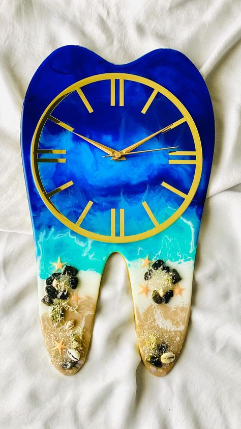 Kashish Panwar’s Instagram profile post: “Perfect gift for your Dentist friend 🦷 Ocean theme clock ⏱🌊 DM to get yours customised 📩 . . . . . #resinclocks#resinwallclock…” Resin Platter, Surreal Art Painting, Clock Resin, Resin Clock, Style Tutorial, Resin Crafts Tutorial, Hijab Style Tutorial, Art Watch, Resin Ideas