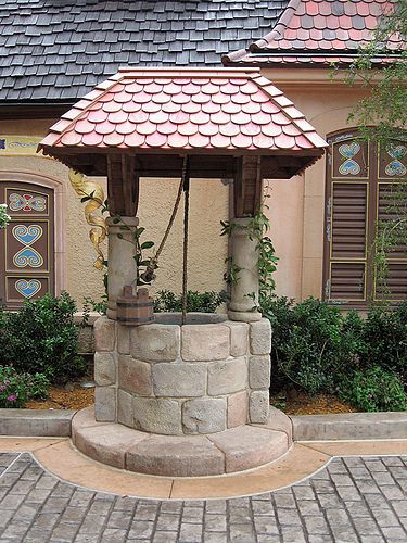 Snow White's Wishing Well | Germany, EPCOT | meeko_ | Flickr Wishing Well Garden, Diy Bird Feeder, Backyard Living, Garden Fountains, Water Well, Garden Structures, Wishing Well, Red Riding Hood, Outdoor Projects