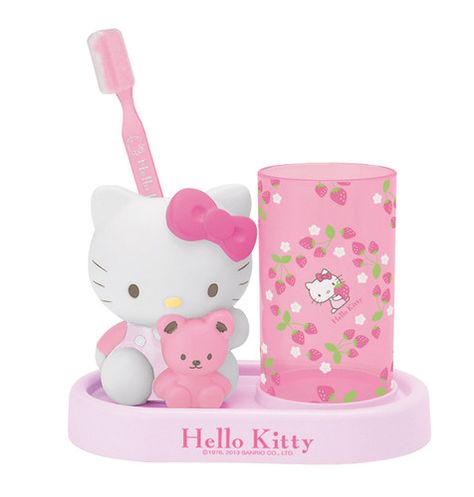 Hello Kitty Strawberry Toothbrush Center    Get excited about toothbrush time whenever you use the Hello Kitty Toothbrush Set. The strawberry-themed set features a removable figurine/toothbrush holder and transparent cup. And let's not forget the most important thing... your set will come complete with a pink Hello Kitty toothbrush!     - 6.5"H x 7"W x 3.8"D   - AS  - BPA Free  - Heat resistant to 176F, cold resistant to -4F  - This product is not microwave or dishwasher safe Hello Kitty Toothbrush, Hello Kitty Bathroom, Hello Kitty Strawberry, Penyimpanan Makeup, Hello Kitty Room Decor, Hello Kitty Merchandise, Hello Kitty Baby, Hello Kitty House, Hello Kitty Rooms