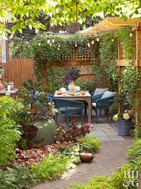 All great parties have great ambiance. Enjoy your summer dinner party under an outdoor canopy of string lights. #entertaining #partytheme #summerpartyideas #bhg Small Courtyard Gardens, Courtyard Gardens Design, Small Courtyards, Garden Wallpaper, Backyard Garden Design, Small Garden Design, Courtyard Garden, Backyard Patio Designs, Outdoor Dining Area