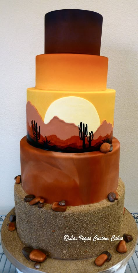 Unique Wedding Cake with a sunrise desert scene made by Las Vegas Custom Cakes Desert Cake Design, Scenery Cake Ideas, Desert Themed Wedding Cake, Desert Theme Cake Ideas, Arizona Cake Ideas, Southwestern Cake Ideas, Desert Birthday Cake, Grand Canyon Cake, Two Cakes Side By Side Birthday