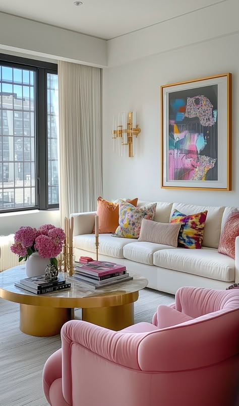 Love this colorful apartment and want to bring some bold vibes into your home decor? Whether you’re adding a splash of color to a neutral space or going full-on bold with an accent wall, bright colors can totally transform a room. In our guide, we’ll show you the best ways to incorporate color without overwhelming your space, with easy tips for beginners and seasoned decor lovers alike. We’ll even break down the basics of color theory, so you’ll know which colors vibe together and which ones clash. Ready to make your space pop? This guide will help you mix, match, and create a fun, bright look that feels totally dopamine decor! Get ready to turn up the color and make every room a reflection of your style! Living Room With Splash Of Color, Colorful Living Rooms With White Walls, Bright Vibrant Living Room, Colourful Luxury Interior, Neutral Interior Design With Pops Of Color, Bright Colour Lounge Ideas, Apartment Living Room Pop Of Color, White Furniture Colorful Accents, Colorful Room White Walls