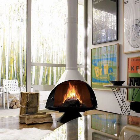 The Best Electric Fireplace for You | Architectural Digest Midcentury Fireplaces, Scandinavian Fireplace, Mid Century Modern Fireplace, Malm Fireplace, Modern Wood Burning Stoves, Hanging Fireplace, Freestanding Fireplace, Traditional Fireplace, Stove Fireplace