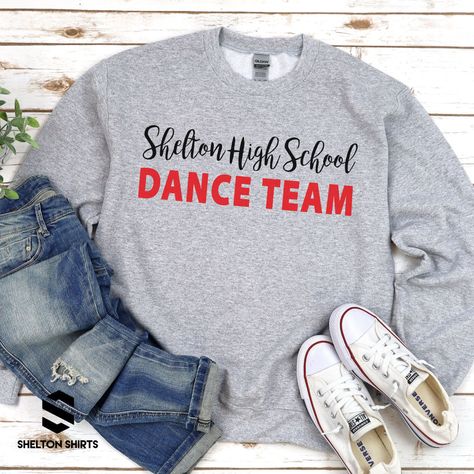 Shelton High School Dance Team Shirt If you’re the school spirit type, this Shelton High School Dance Team Shirt is for you! Get ready to show your SHS pride with this comfortable and stylish shirt, perfect for cheering on your favorite dance squad. Go Climbers!! Choose T-shirt, Crewneck Sweatshirt or Hoodie Sweatshirt. Super comfy unisex sizes. Our shirts, hoodies, and sweatshirts are crafted with comfort and quality in mind. Made from premium materials, they are soft, durable, and perfect for