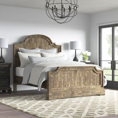 This low-profile standard bed makes a rustic statement in your farmhouse-themed bedroom. Crafted from solid and engineered wood with a weathered gray finish, this bed features a 65'' arched panel headboard that makes an impact. Molding details around the trim match the footboard's scooped corners for a curated, cohesive look. We love that this bed frame is compatible with an adjustable bed for your comfort. This bed is complete when you add a box spring and mattress of your choice (sold separate Canopy Bed Wood, Low Profile Canopy Bed, Farmhouse Bedroom Bedding, Bed Wood, Adjustable Bed, Tuscan House, Standard Bed, Themed Bedroom, Basement Bedrooms