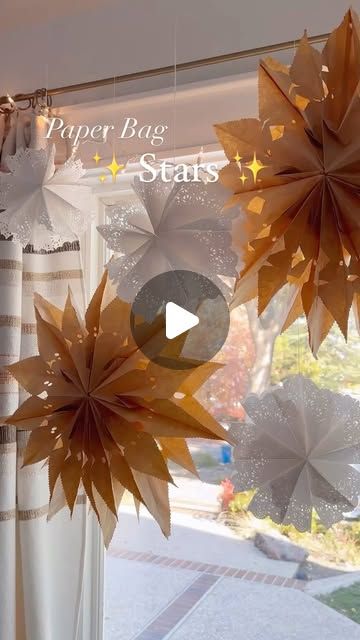 Mia Volk on Instagram: "These beautiful paper bag stars ⭐️ are one of my favorite easy holiday decor DIYs! Each year I like to make a few more to add to the collection, and this year I may try using white paper bags as well! They look lovely as window decorations, on the Christmas tree, attached to garlands, and all over bookshelves and banisters! 🎄They’re so simple and affordable to do, and make a great kids craft too!   #christmasdecor #paperbagstar #paperbagstars #holidaycrafts #holidaydiy #christmascraft #christmasdiy #papercrafts #holidaydecor #handmadechristmas #papersnowflakes #paperstars" Paper Star Garland, Paper Bag Stars, Easy Holiday Decor, Star Window, Simple Holiday Decor, Window Decorations, Star Garland, Paper Snowflakes, Paper Stars