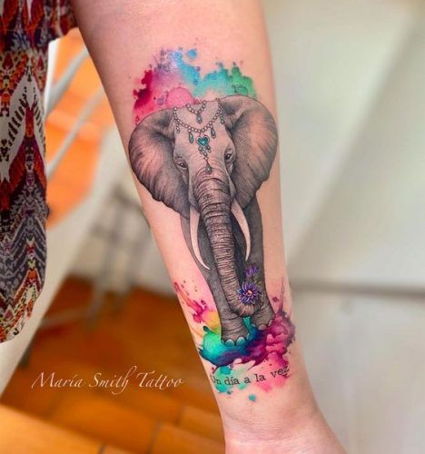 19 Elephant Tattoo Ideas with Flowers Tattoo Designs Elephant, Geometric Elephant Tattoo, Elephant Tattoo Ideas, Colorful Elephant Tattoo, Elephant Thigh Tattoo, Elephant Family Tattoo, Mandala Elephant Tattoo, Cute Elephant Tattoo, Elephant African