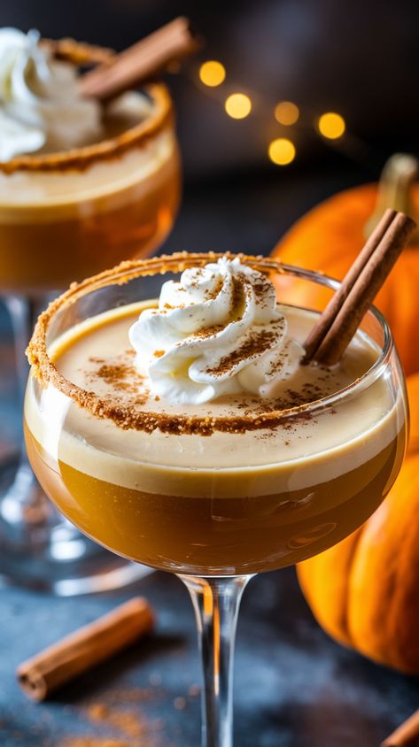 Elegant pumpkin martini with whipped cream, cinnamon stick and autumn accents in moody lighting Pumpkin Spice Martini Recipe, November Cocktails, Fall Martini Recipes, Fall Martinis Recipes, Pumpkin Martini Recipe, Cozy Hot Drinks, Pumpkin Martini, Pumpkin Drink, Energizing Smoothies