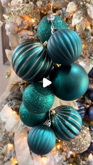 Ivey | Lifestyle + Home on Instagram: "Hey, love bugs, I thought I’d share one of my most popular videos. I still swear by ornament clusters. They create such a nice look on your Christmas trees, garland, and wreaths. I’ll definitely be doing this again this holiday season. Enjoy!

#ornamentclusters #ornaments #christmas #christmasdecor #christmastree #diychristmas #diychristmasdecor #christmasdiy #christmastips #christmasvideos #viralchristmas" Christmas Balls Ideas Decoration, Decoration With Christmas Balls, Purple Teal Christmas Tree, Ornament Ball Garland, Ornament Arrangement Ideas, Bauble Garland On Tree, Christmas Ornaments Garland Diy, Ornaments Garland On Tree, Diy Ball Garland Christmas Tree