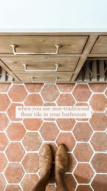 Becky George | House + Home on Instagram: "WHY I CHOSE TERRACOTTA for my bathroom flooring:

✨we used pure 6x6 terracotta hex tiles and put a clear sealant on top for protection—this selection was a huge risk—most people use it for outdoor spaces, but in my mind, why not for a bathroom?! I’m so glad I chose it because it’s unique for this space and people always ask us about it!

✨I knew I wanted something different, long lasting and timeless. terracotta tiles are unique, beautiful (with natural color striations), durable, and super easy to maintain (with a proper seal to protect from any staining). 

we are over a year since install, and NO REGRETS!! would you try this?! happy to answer any questions you might have!

#bathroomdesign #bathroomtile #terracotta #homedecor #homeinspo #lovewhe Bathrooms With Terracotta Floors, Terracotta Floor Tiles Bathroom, Bathroom With Terracotta Floor Tiles, Bathroom Floor Tiles Design Ideas, Terracotta Floor Bathroom, Terracotta Bathroom Ideas, Terracotta Bathroom Tiles, Terracotta Tile Bathroom, Terracotta Tiles Bathroom