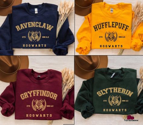 Magical Wizard Hogwarts House Harry Potter Sweatshirts Check more at https://viralustee.com/product/magical-wizard-hogwarts-house-harry-potter-sweatshirts/ Harry Potter Sweat Shirt, Harry Potter Hoodie Sweatshirts, Harry Potter Tshirt Ideas, Harry Potter Aesthetic Outfits, Hufflepuff Sweatshirt, Gryffindor Hoodie, Hogwarts Hoodie, Harry Potter Jumper, Harry Potter Clothes