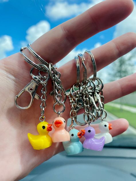 "Duck Duck! #youvebeenducked Join in on the ducking fun with these super cute and tiny rubber ducky keychains! Colors Available: - white - yellow - blue - lilac - pink / peach Duck Measurements: .67\" x .83\" These are mini and adorable! The perfect gift for any Jeep driver! DuckDuckGame / DuckDuckJeep / duck rearview hanger / duck car charm / duck car accessories / rubber ducky car charm /rubber duck car decor / 4x4 game / you've been ducked / duck accessory" Duck Themed Gifts, Duck Merch, Duck Items, Duck Accessories, Duck Decorations, Mini Ducks Toy, Hanging Duck For Car, Duck Things, Jeep Decor