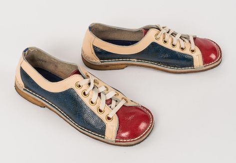 Shoes of red, white, and blue leather, designed as flats, with rounded toes. Toebox and tongue of red leather, the sides are of blue leather, and the heel and uppers are edged in wide bands of white, lace up the instep, with five holes. Believed to be bowling shoes.    Measurements:   Length: 26 cm  Width: 10cm  Height: 8cm  Heel: 1.5cm (1/2") Texas Fashion, University Of North Texas, Bowling Shoes, Wide Bands, Historical Fashion, Red White And Blue, Blue Leather, Bowling, Red Leather