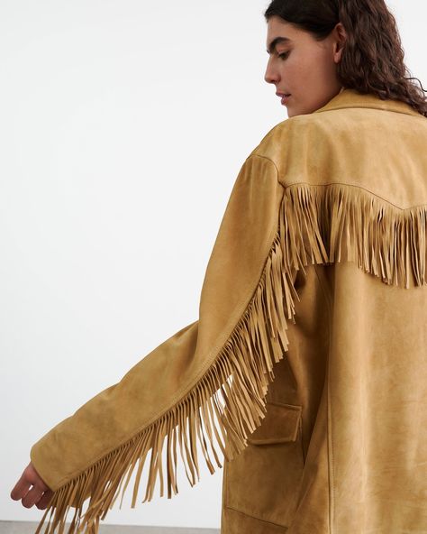 Relaxed jacket in Italian lambskin suede. Fringe detail at front and back yoke and sleeves. Patch pockets with flaps. Horn buttons at center front. Angled yoke at front and back. Center back seam detail. Leather locker loop. Fully lined. Denim Editorial, Tassel Jacket, Maxwell House, Cowgirl Look, Suede Blazer, Suede Fringe Jacket, Jackets Denim, Suede Tassel, Fringe Jacket