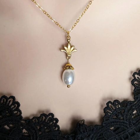 Timeless elegance in every detail ✨ Our vintage-style gold and pearl necklace pendant is the perfect touch of classic sophistication. Grab yours today from my website or Etsy shop. Links in bio. #VintageStyle #GoldAndPearl #TimelessElegance #JewelryLove #Papillionera #toronto #torontolife #vintagestyle #historicalfashion #historicalcostuming Gold And Pearl Necklace, Regency Jewelry, Belle Epoque Fashion, Pearl Necklace Pendant, Delicate Beauty, Pearl Pendant Necklace, Victorian Jewelry, Historical Fashion, Necklace Pendant