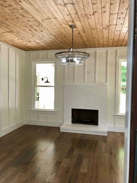 White Beat Board Ceiling, Tongue And Groove Ceiling Dining Room, Ceiling Planks Ideas Living Room, Dark Rustic House Interior Design, White Trim With Wood Doors And Windows, Wood Ceilings And Floors, Cottage Wood Ceiling, Wood Living Room Ceiling, Hardwood On Ceiling