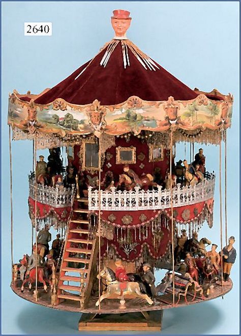 Huge two-story toy carousel. Size: 82 cm high, 60 cm diam. Ca. 1900 Made from wood / dough figurines, horse riders, benches, Zinngeländer, velvet walls, embroidered beads, paneling, painted pressboard. Toy Carousel, Victorian Toys, Musical Box, Carousel Horses, Merry Go Round, Tin Toys, Antique Toys, Rocking Horse, Horse Rider