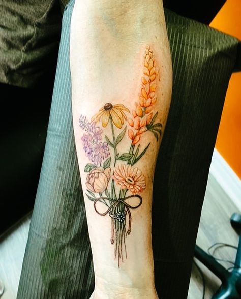 Natural color tattoo
Flower tattoo
Bouquet with ring
Forearm flower tattoo Wildflowers Tattoo Color, Colorful Botanical Tattoo, Wildflower Bouquet Tattoo Colour, Texas Wildflower Bouquet Tattoo, Wildflower Tattoo Thigh, Wedding Bouquet Tattoo, Farm Tattoos For Women, Bouquet Flower Tattoo, Best Flower Bouquet