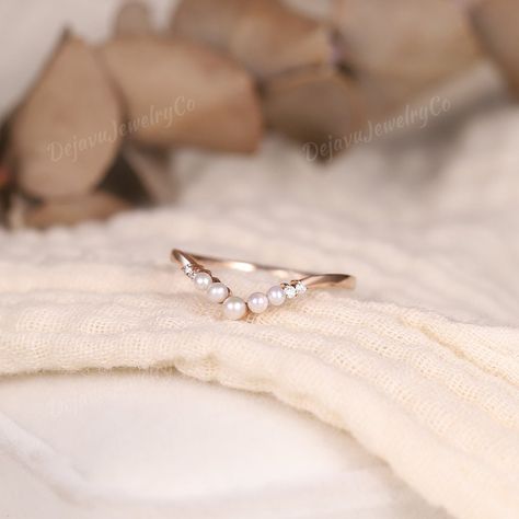 Unique Pearl Wedding Band Women Rose Gold Moissanite Pearl Curved Engagement Ring Promise Matching Stacking Band June Birthstone Jewelry ✦ Handmade, high-quality item ✦ Material: SOLID 14K/18K GOLD ( can be made in yellow/white/rose gold ) ✦Stones: Pearl & Moissanite ✦Moissanite weight: about 0.028ct ✦Moissanite Color: DEF Color ✦Shaped: Round ✦ Band Width: Around 1.6mm LET'S CONNECT Email us - dejavujewelry@outlook.com Feel free to contact me for any questions.:) PRODUCTION We are jewelry artis Pearl Promise Rings For Her, Pearl Wedding Band With Diamond Engagement Ring, Pearl Wedding Band Stack, Pearl Engagement Ring White Gold, Pearl Curved Wedding Band, Simple Pearl Engagement Ring, Pearl Wedding Band With Diamond Ring, Pearl Band Ring, Wedding Band Ideas For Women