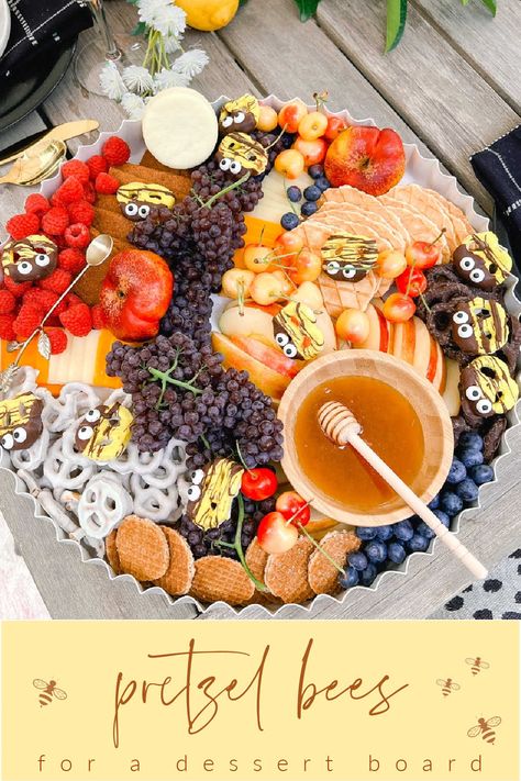 Honey-Themed Dessert Board with Pretzel Bees. Create a whimsical and delicious dessert board with sweet fruits, snacks and adorable pretzel bees. Bee Gender Reveal Snacks, Honey Themed Charcuterie Board, Honey Bee Charcuterie Board, Honey Themed Food, Bee Charcuterie Board, Fall Bruschetta, Bruschetta Party, Bee Themed Food, Fresh Bruschetta