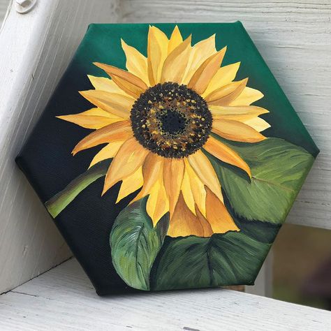 Megan Rose on Instagram: “Sunflower 🌻  Oil paint on a 8” by 6 7/8” hexagonal canvas. Finished on October 8th, 2019. Will be listed for sale on my Etsy shop soon! ➡️…” #sunflower #acrylic #painting #floral #yellow #walldecor #decor #sunflowers #artist #artistsonpinterest #oilpaint Paintings On Hexagon Canvas, Hexagon Canvas Painting Ideas Acrylic, Hexagon Painting Ideas, Hexagonal Painting, Hexagon Painting Canvas, Hexagon Canvas Painting Ideas, Acrylic Sunflower Painting, Sunflower Painting On Canvas, Hexagon Painting