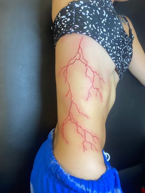 Red Ink Lightning Tattoo, White Lighting Bolt Tattoo, Lighting Bolt Tattoo Red Ink, Pink Lightning Tattoo, Red Lightening Tattoo, Lightning Spine Tattoo, Red Lightning Bolt Tattoo, Blue Lightning Tattoo, Lightnight Bolt Tattoo