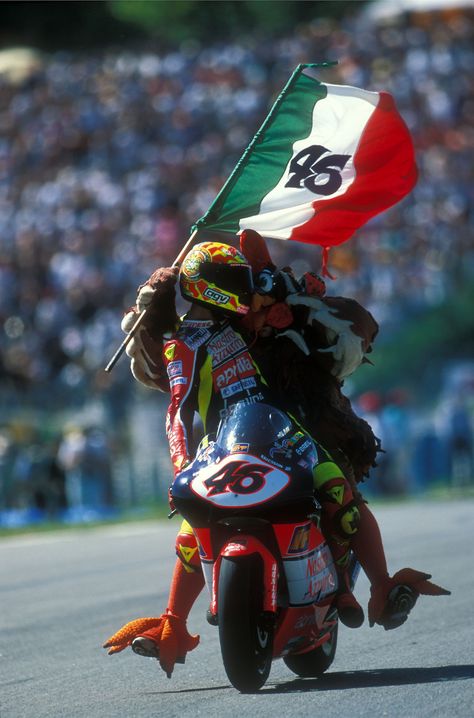 Celebrate it like a Rossi! Valentino ROSSI, Nastro Azzurro Aprilia, Aprilia RSW 250, 1998 GP Marlboro De Catalunya, 250cc Race, Circuit de Catalunya, Barcelona, Sunday 20 September 1998, finished 1st "il pollo Osvaldo" Vale Rossi, Vr46 Valentino Rossi, Motogp Rossi, Motogp Valentino Rossi, Professional Motorcycle Racer, Valentino Rossi 46, Say Nothing, Bike Pic, Racing Suit