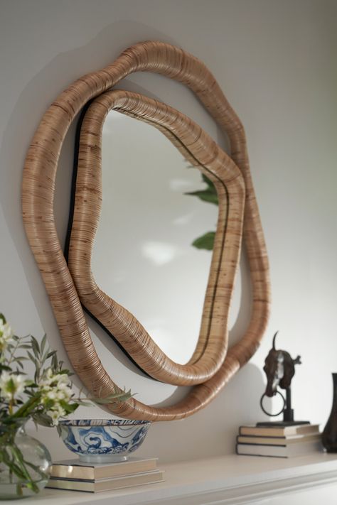 Mirror features natural rattan hand-wrapped over a wood frame. Rattan is a natural material and may vary in color. Mirror includes metal hardware for mounting. Wicker Framed Mirror, Woven Mirror Frame, Rattan Mirror Wall Decor, Mirror Drawing, Mirror Texture, Hippie Room, Mirror Drawings, Boho Mirror, Wicker Mirror